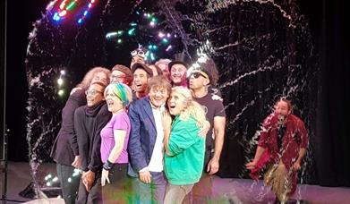 A group of people inside a large bubble