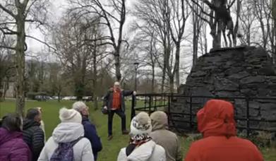 a tour group gathered outside