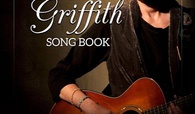 Cconert poster showing picture of Nanci Griffith.