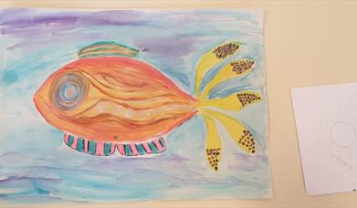 a colourfully painted fish