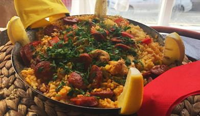 a freshly cooked dish of traditonal Spanish paella