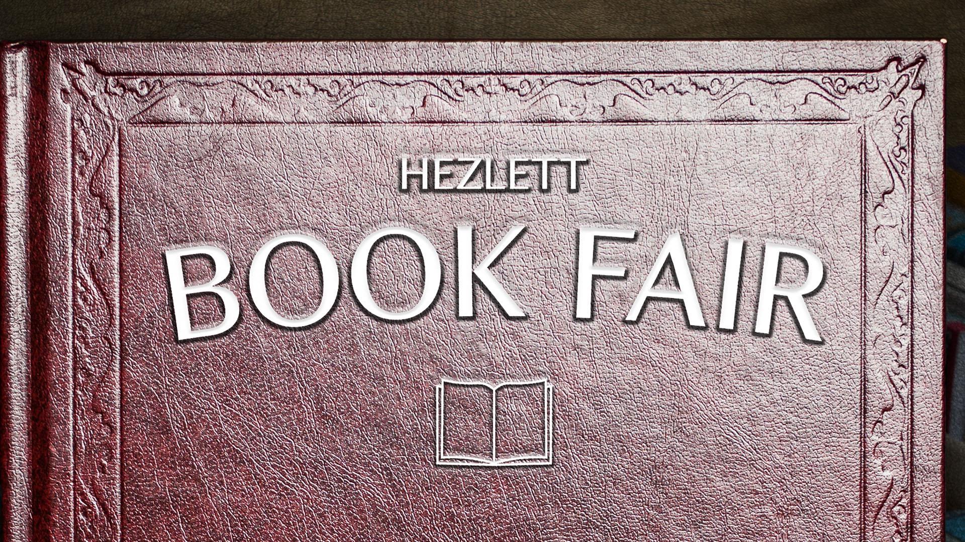 A poster for the National Trust's Hezlett Book Fair, embossed along the cover of an old leather bound book.