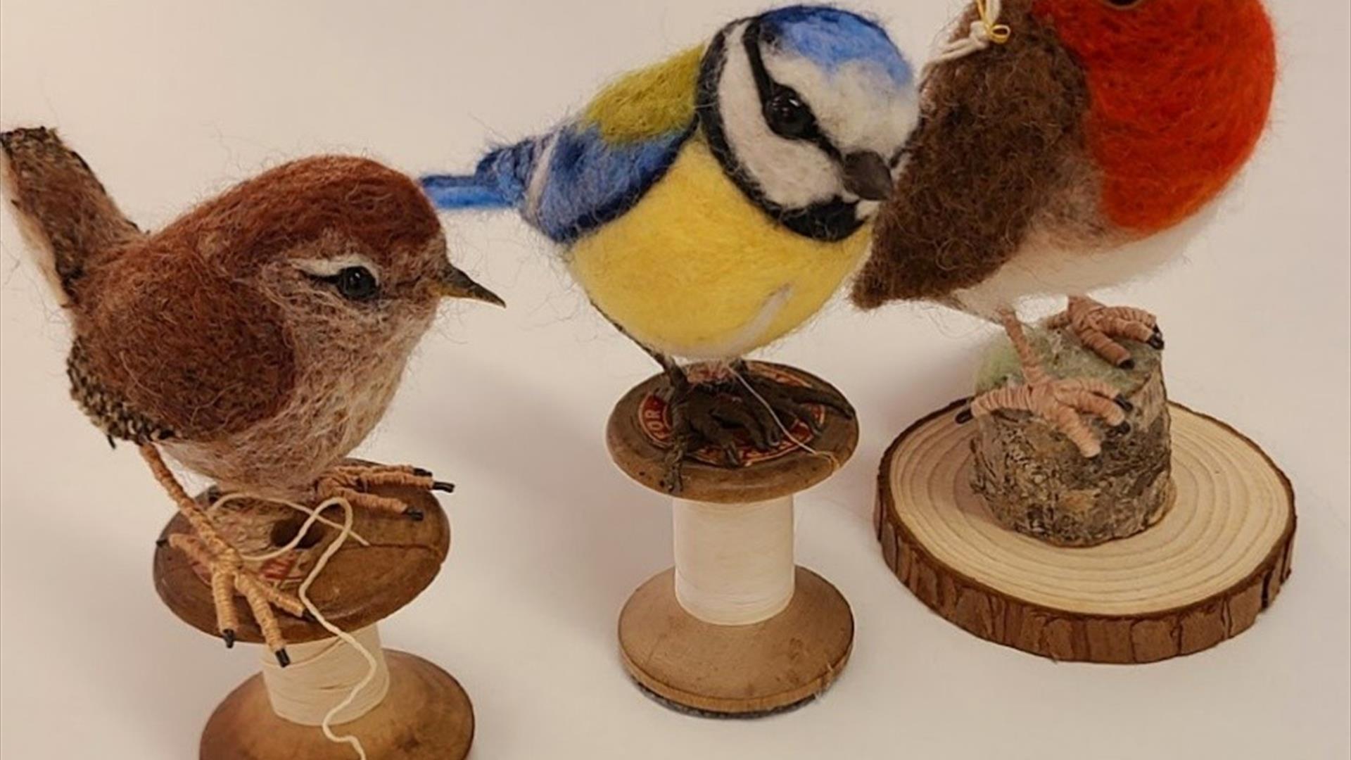 3 needle felted birds on little wooden stands