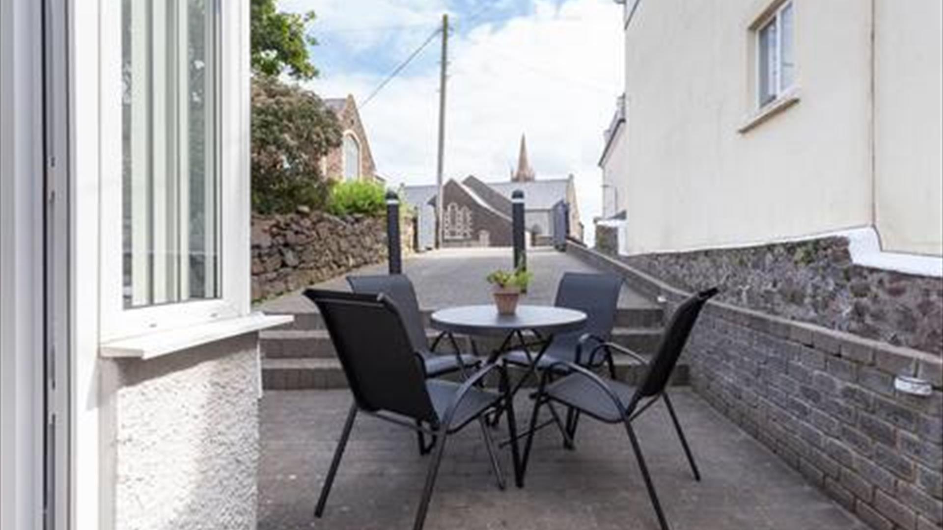 Outdoor patio area with furniture