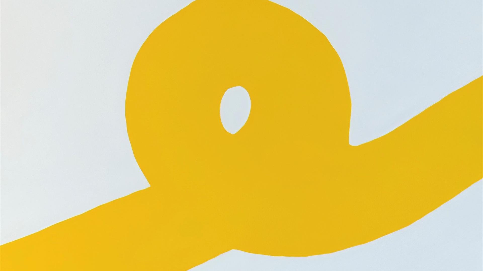 a yellow loop shape on a plain background