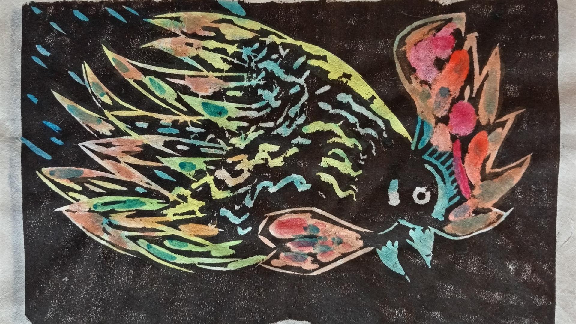 lino print of a colourful rooster