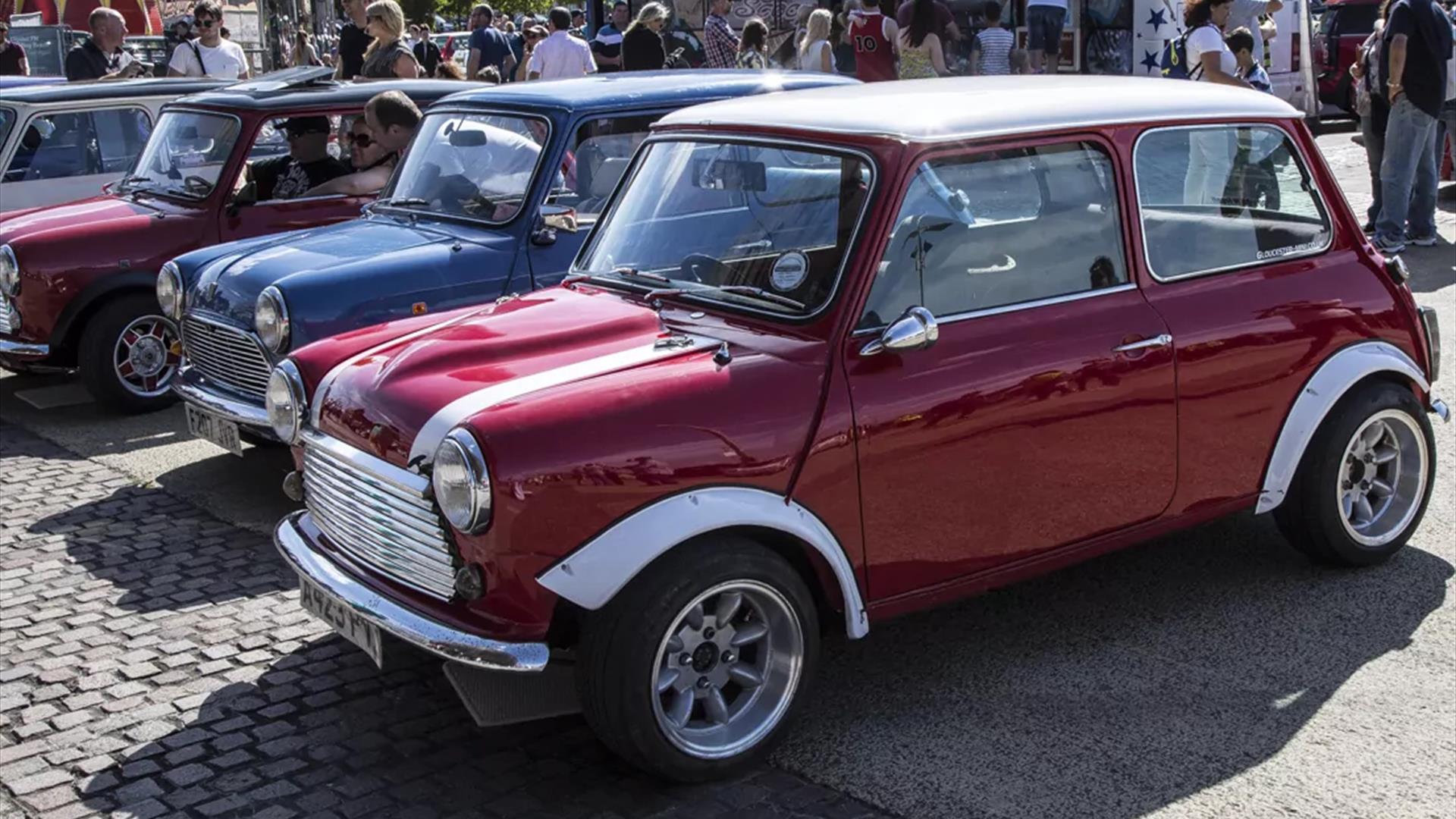classic mini coopers on display during the daytime