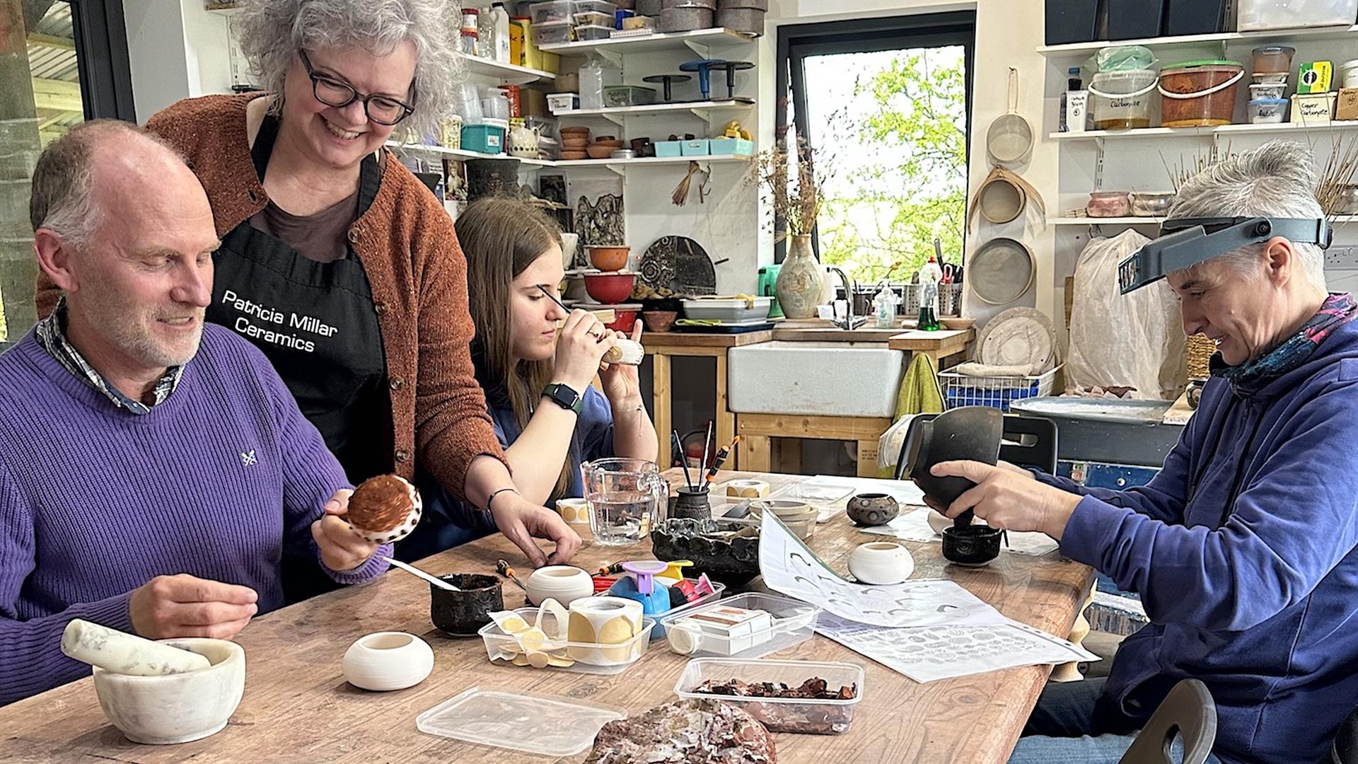 Decorating pottery with local ochre