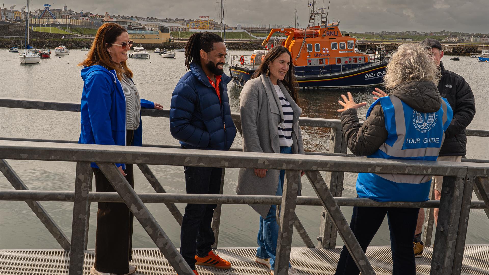 Discover Portrush Walking Tours in front of Portrush lifeboat