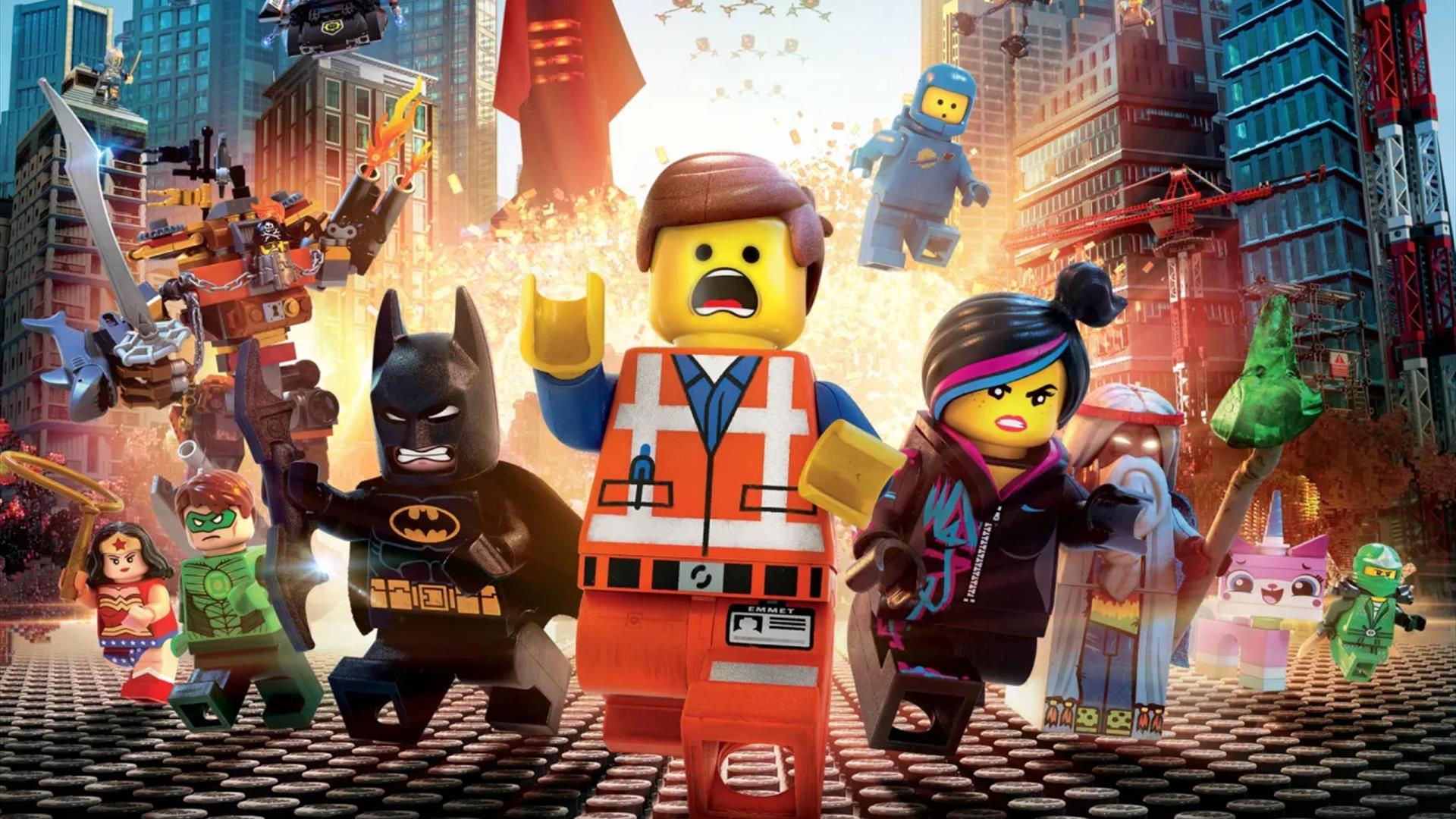 the lego movie poster, showing the main character running from an explosion surrounded by other Lego characters
