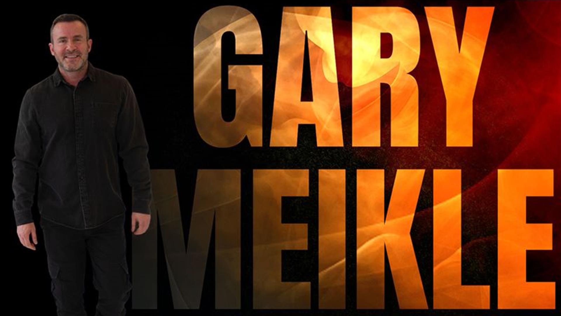 Image shows a man in a black suit with the words 'GARY MEIKLE' beside him