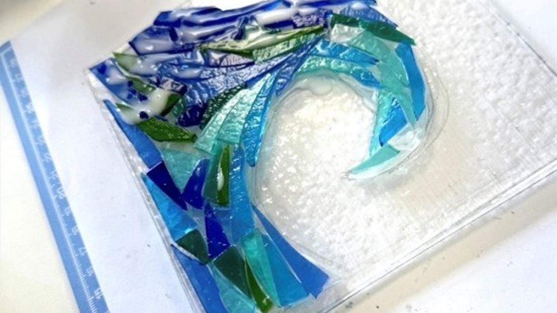 fused glass sea wave on a white background