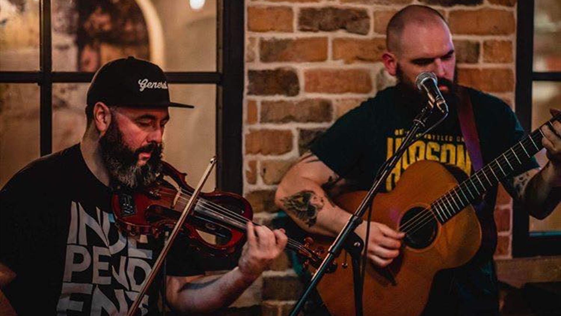 String Ninjas band performing on stage.