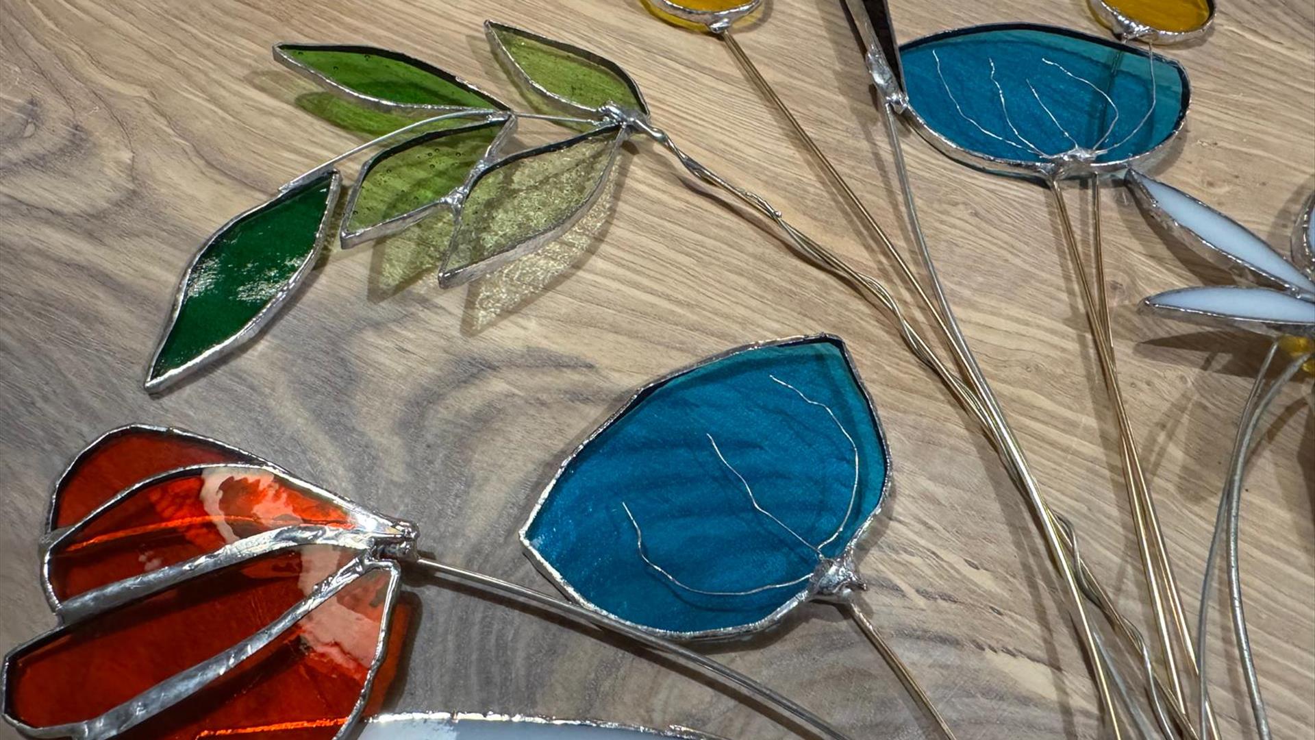 close up of a tiffany glass bouquet of colourful flowers.