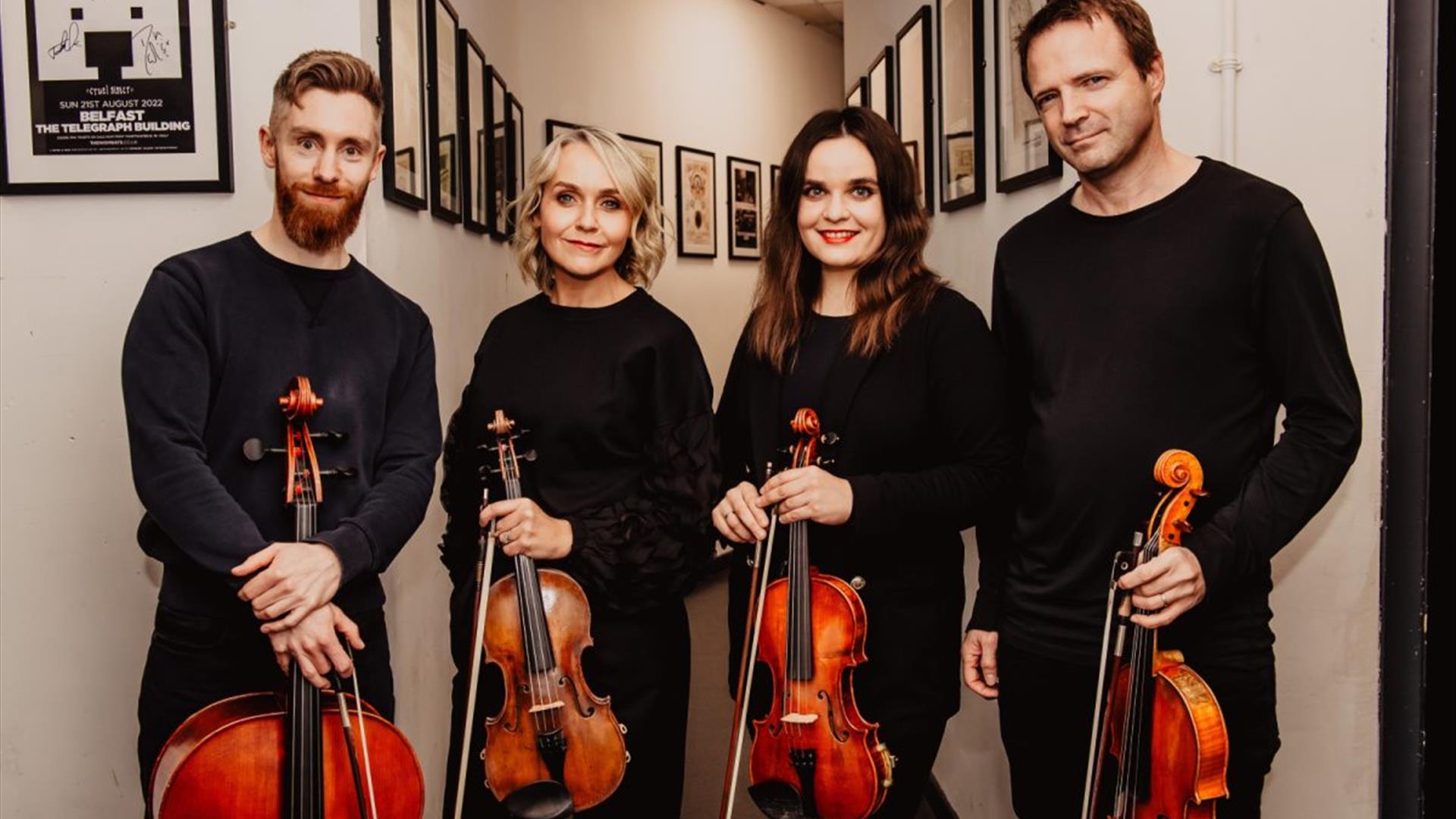 the archo string quartet with their instruments