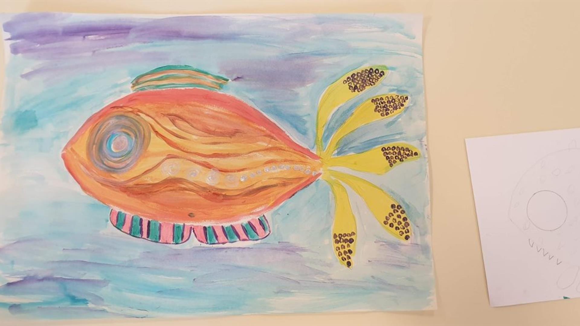 a colourfully painted fish
