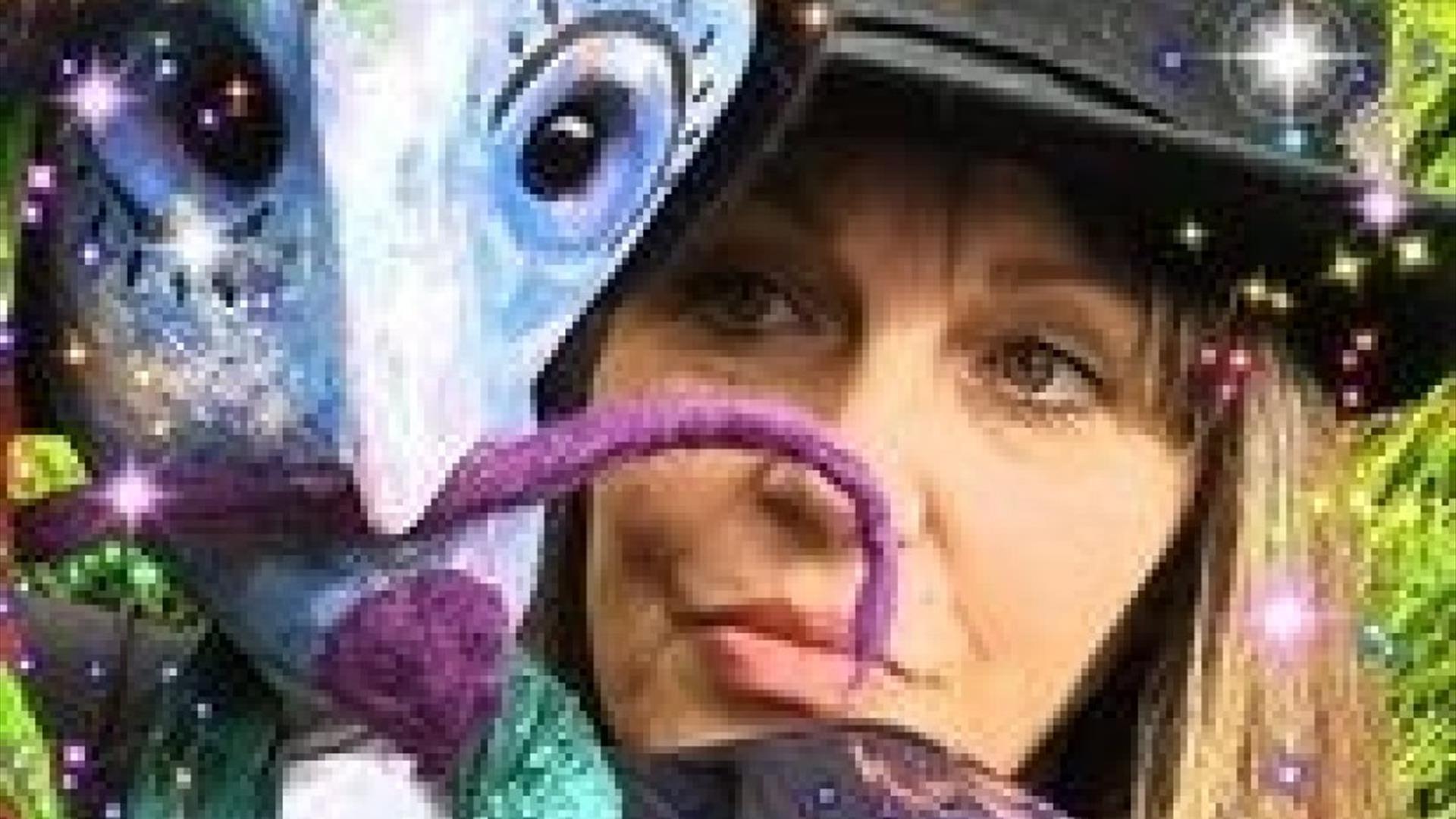 paddy picasso with one of her brightly coloured puppets