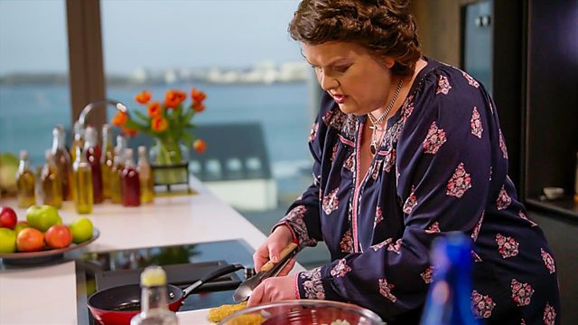 Celebrity Chef Paula McIntyre cooks in a kitchen

