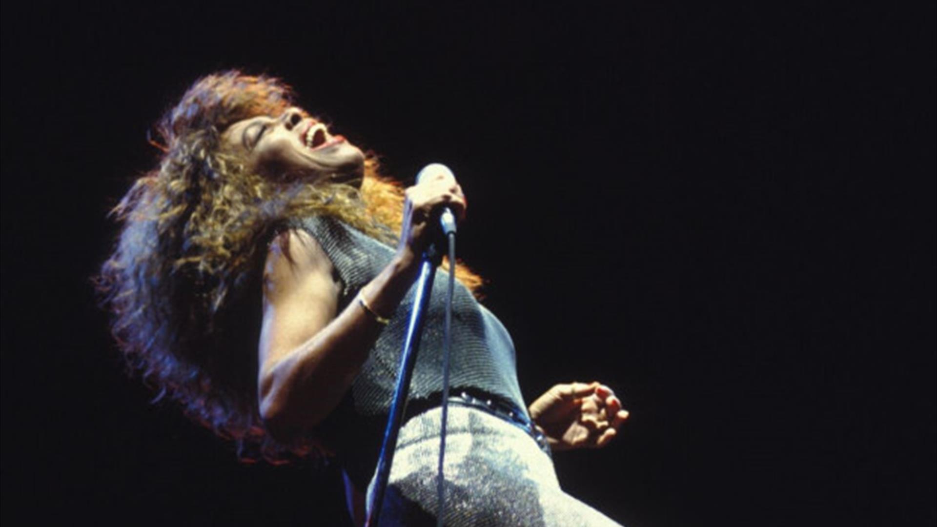 amanda lane performing against a black background