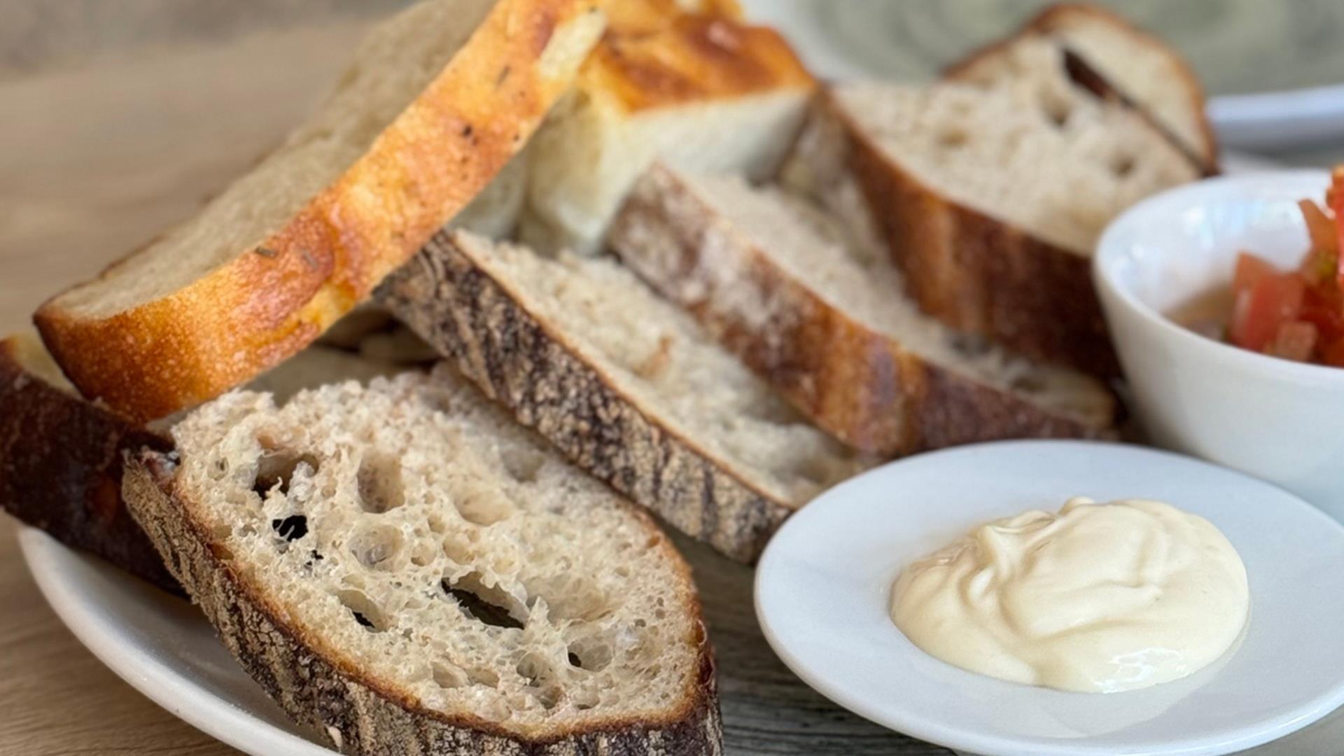 sourdough bread served with a dipping sauce