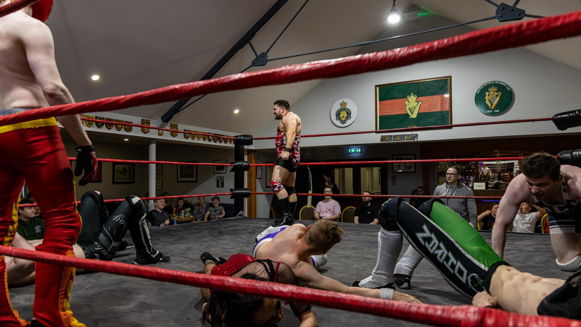A number of wrestlers performing in ring at the Ballymoney Legion Hall.