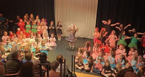 Image of Irish dancers performing on stage at Roe Vallet Arts Centre.