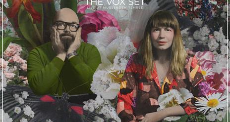 A poster for the Darkling Air's Vox Set concert at Mussenden Temple. A bespectacled man sits on the left, and a woman with a colourful patchwork shirt