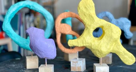 a set up abstract clay sculptures
