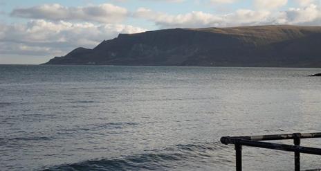 a view over the sea out towards Glenariff from Cushendall Beach