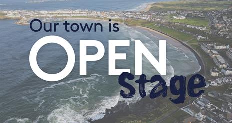 text reads 'Our Town is Open stage' overlayed on an aerial image of Portrush
