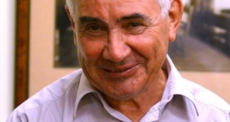 Close up image of a man, Paul Arthur smiling