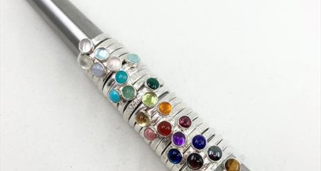 A selection of beautiful silver stacking rings with semi-precious stones