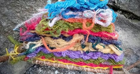 colourful tapestry wefts on twigs