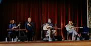 a band performs on stage at Portrush Town Hall