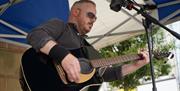 Man playing a guitar