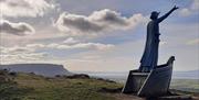 The statue of Mannanan Mac Lir on top of Binevenagh