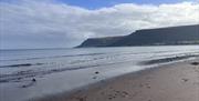 Waterfoot Beach with views out to Glenariff