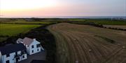 aerial view of exterior of Atlantic Lookout Holiday accommodation at sunset