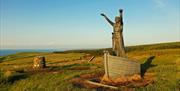 statue of Mannanan Mac Lir atop Binevenagh Mountain