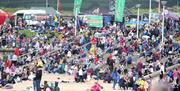 spectators crowd the beach at the NI International Air Show in Portrush