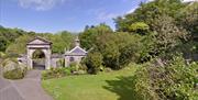 Gated entrance and private lodge at Downhill Gardens