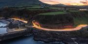 Red Arch with Cushendall in the background