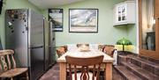 Image of kitchen table in Metropole Lodge