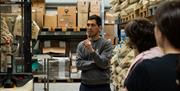 A group of people enjoying the Fidela Roastery and Coffee Tasting Tourr