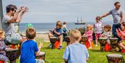 Fun with Drums Instructor taking a class with a group of children