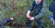 A man showcasing a local water species