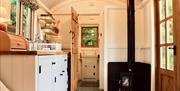 Peatland shepherd's hut kitchen and stove