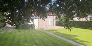 Rear of property showing lawn