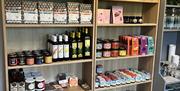 shelves are stocked with local produce including coffee, oils and preserves at Chestnutt's Farm Shop