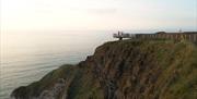 people standing on the viewing platform at Magheracross viewpoint